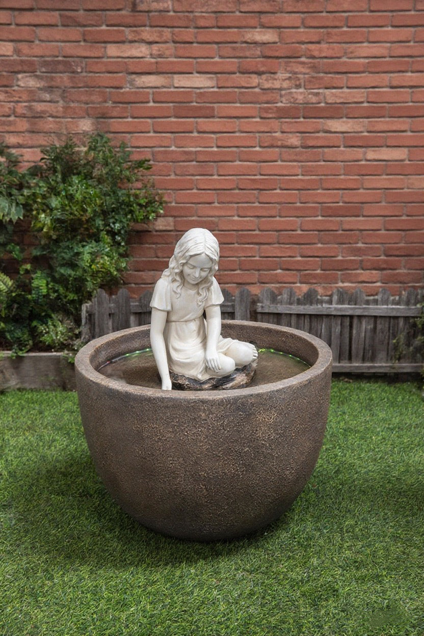 Sculpture of a Girl in the Courtyard