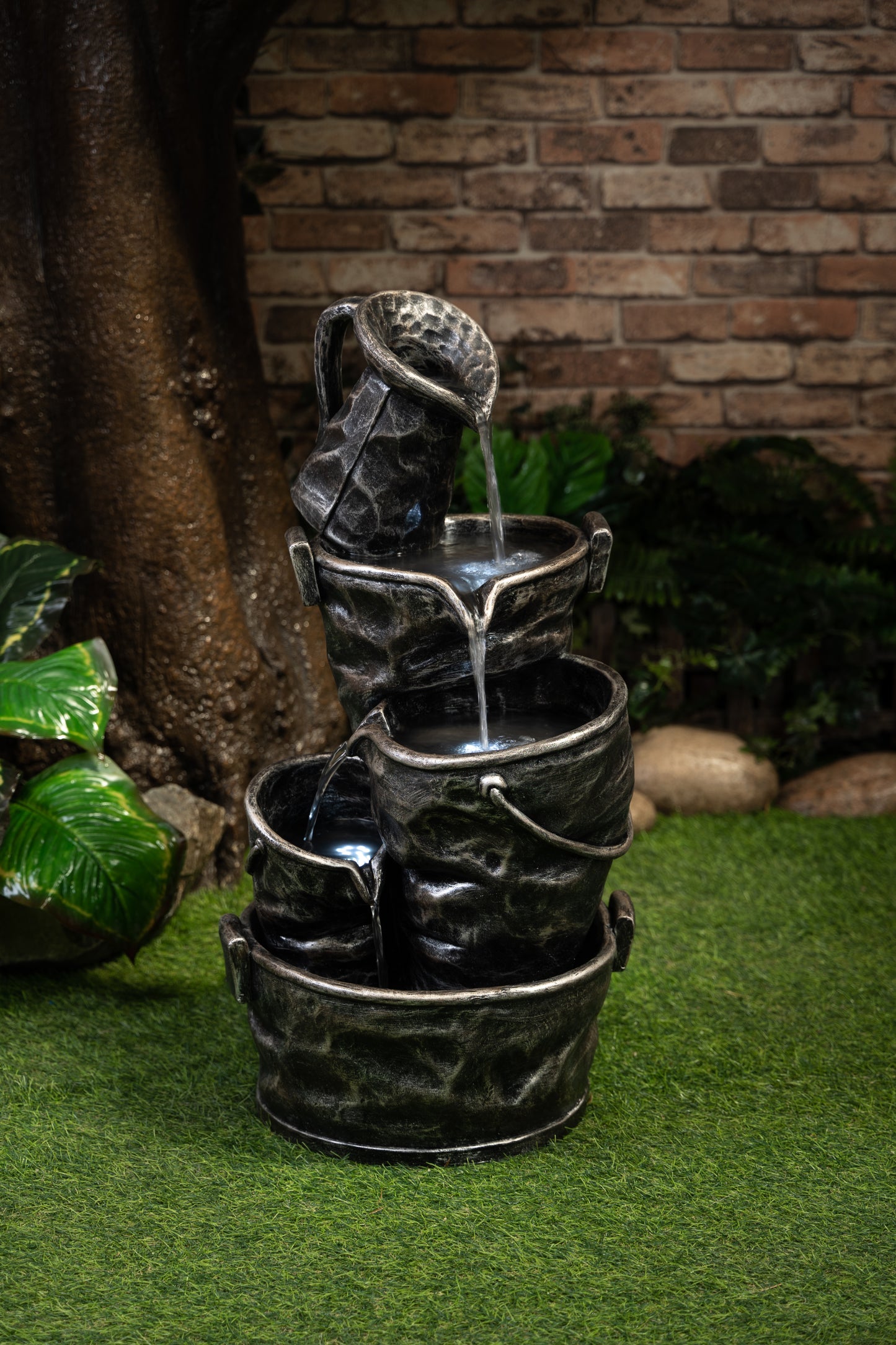 Stacking buckets and flowing water to create scenery