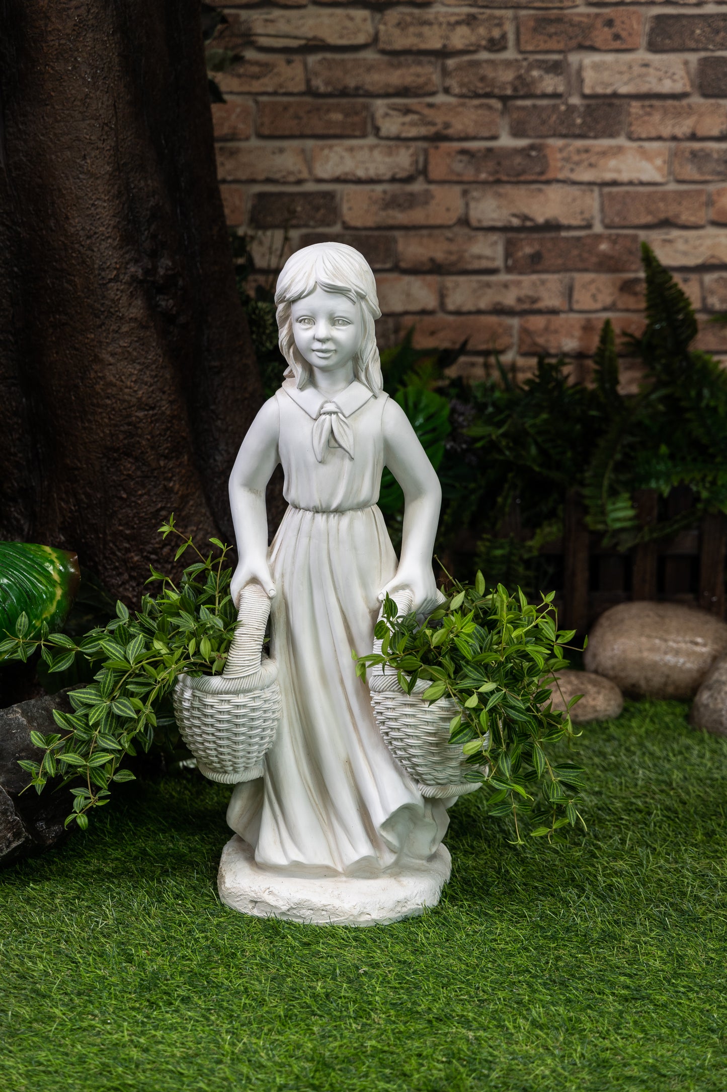 Sculpture of a Basket Carrying Girl